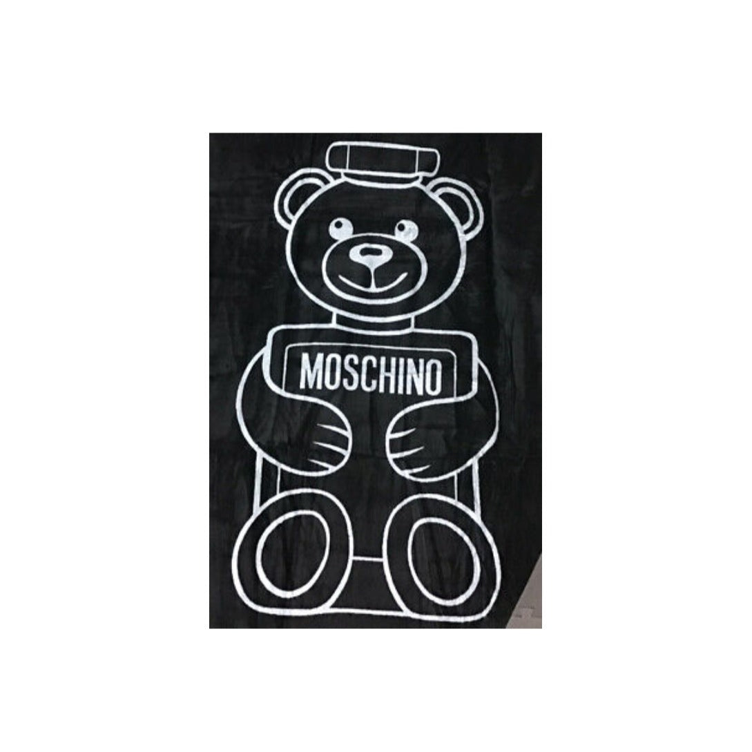 Moschino Toy Boy Beach Towel featuring the iconic black and white teddy bear design, perfect for the beach or poolside