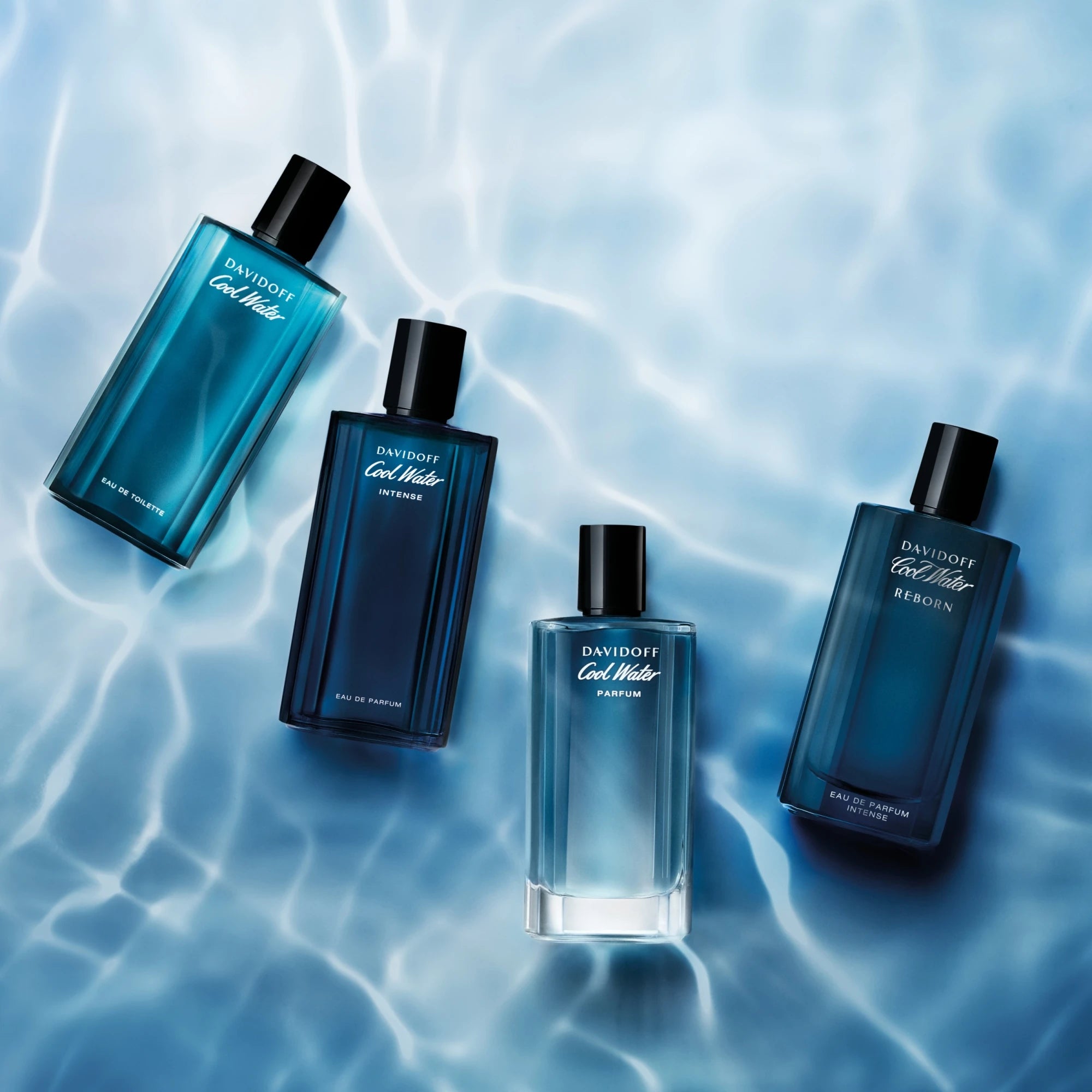 Four Davidoff Cool Water perfume bottles on a water-like textured background