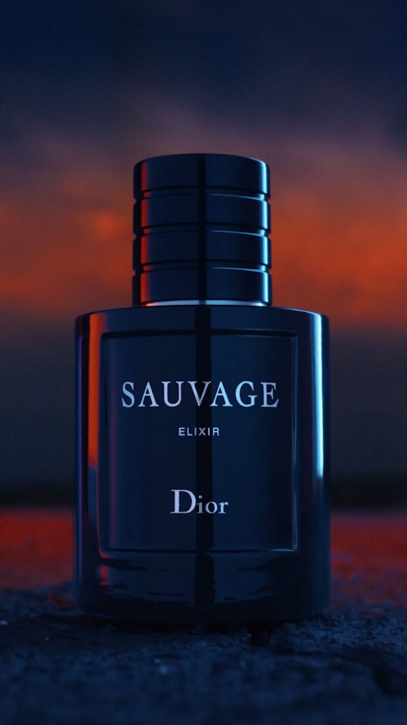 Dior Sauvage Elixir perfume bottle with a dark background