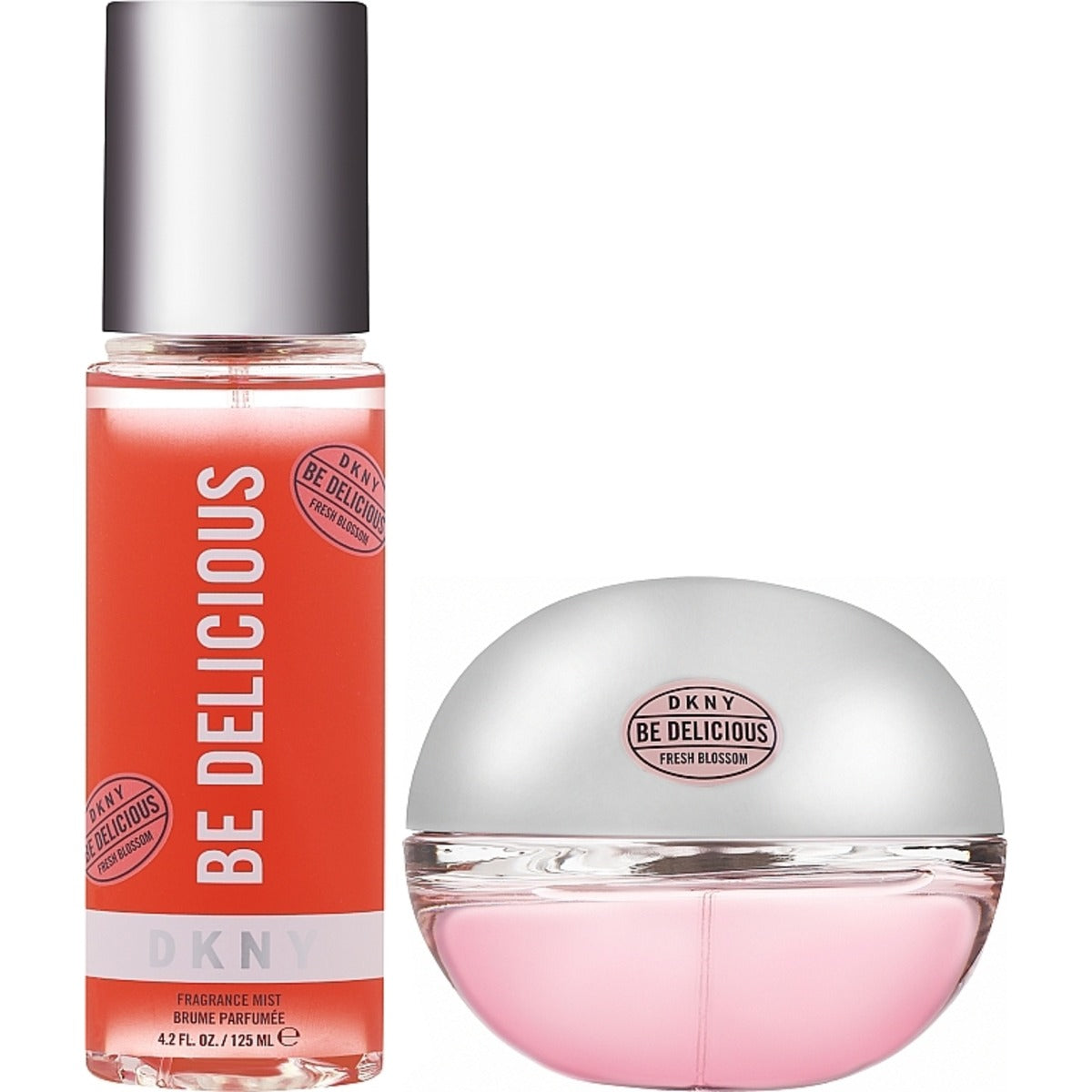 DKNY Be Delicious fragrance mist and matching perfume set, featuring a clear bottle with pink liquid and a silver cap next to a matching round silver bottle with a pink base, on a white background.