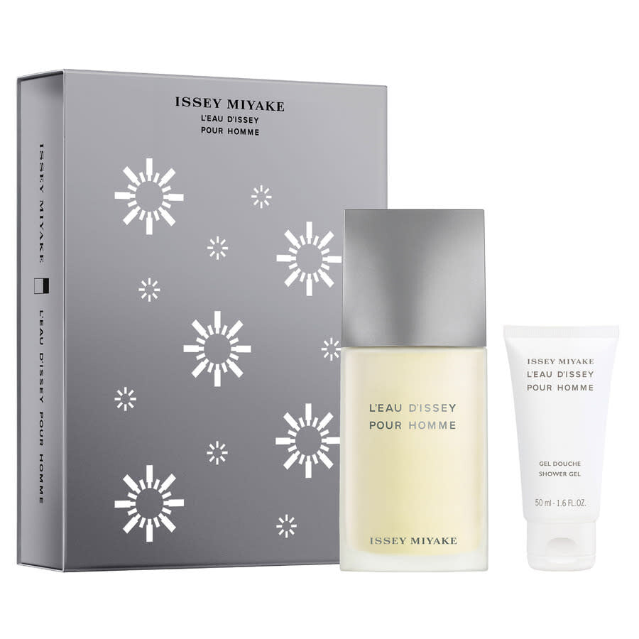 Issey Miyake Léau Dissey Pour Homme fragrance set with bottle and shower gel on a white background