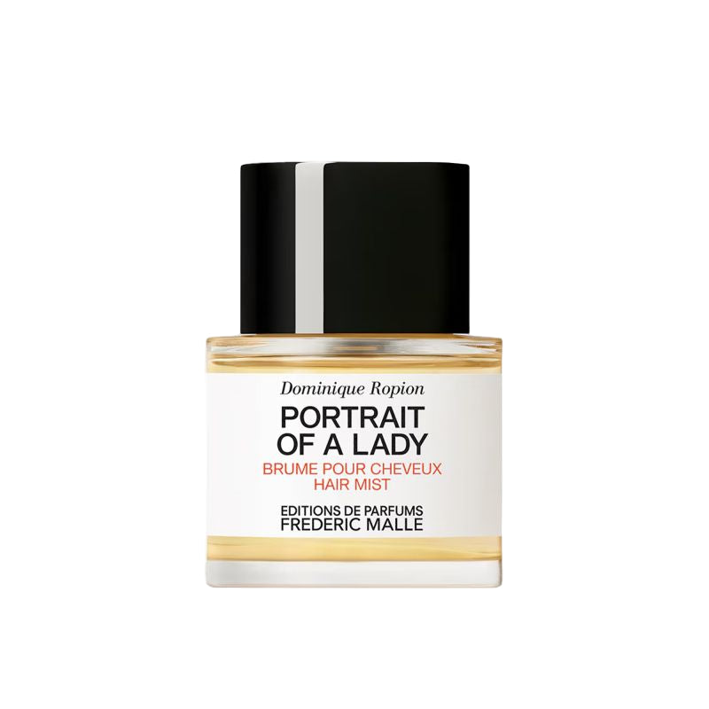 Hair mist bottle labeled 'Portrait of a Lady' by Frederic Malle on a white background