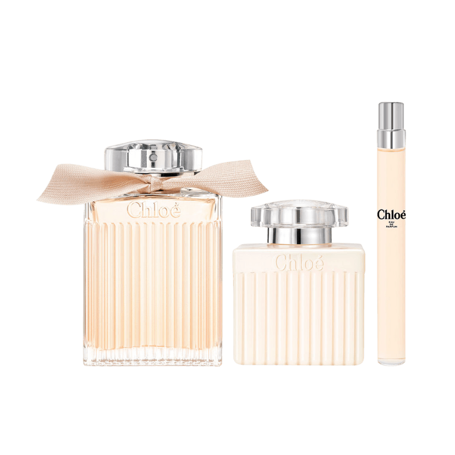 Chloé Eau de Parfum gift set with 100ml bottle, 10ml spray and 100ml body lotion in the iconic pleated glass bottle with hand-tied ribbon
