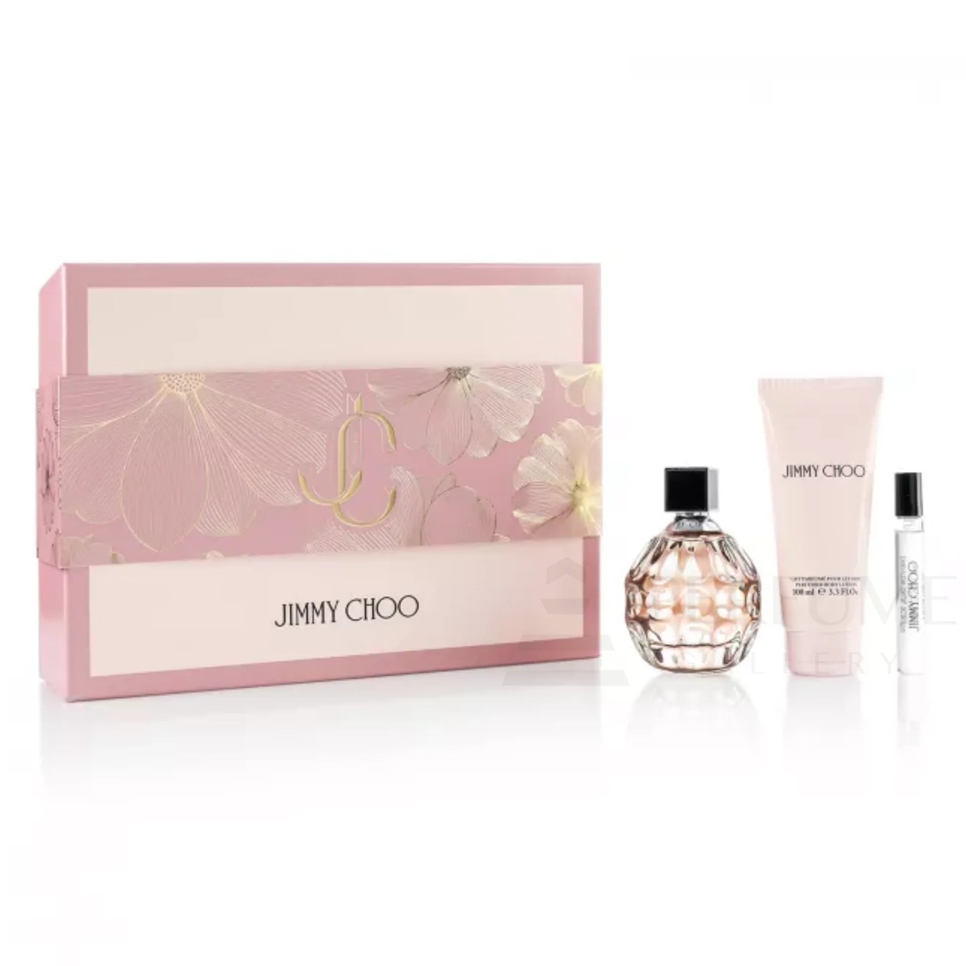Jimmy Choo Woman Eau De Parfum gift set with 100ml perfume, 7.5ml travel spray, and 100ml body lotion in elegant packaging.