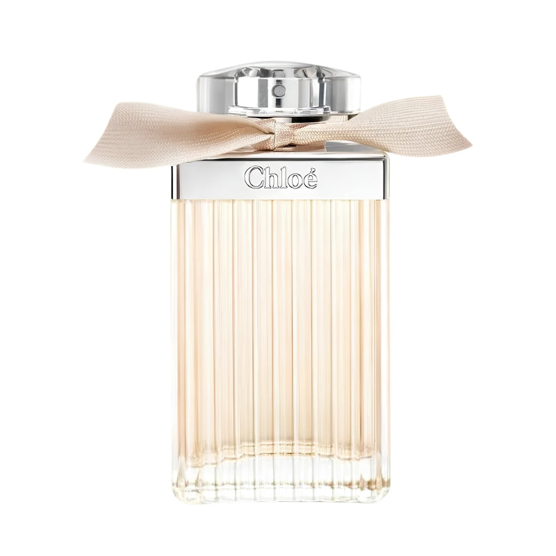Chloé eau de perfume bottle with the Chloé logo and a beige ribbon bow tied around the neck, on a white background.