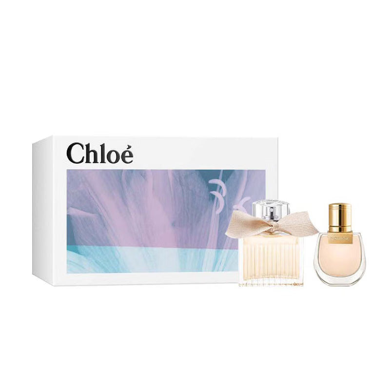 Chloe perfume set with signature 20ml and nomade 20ml bottles and a box on a white background