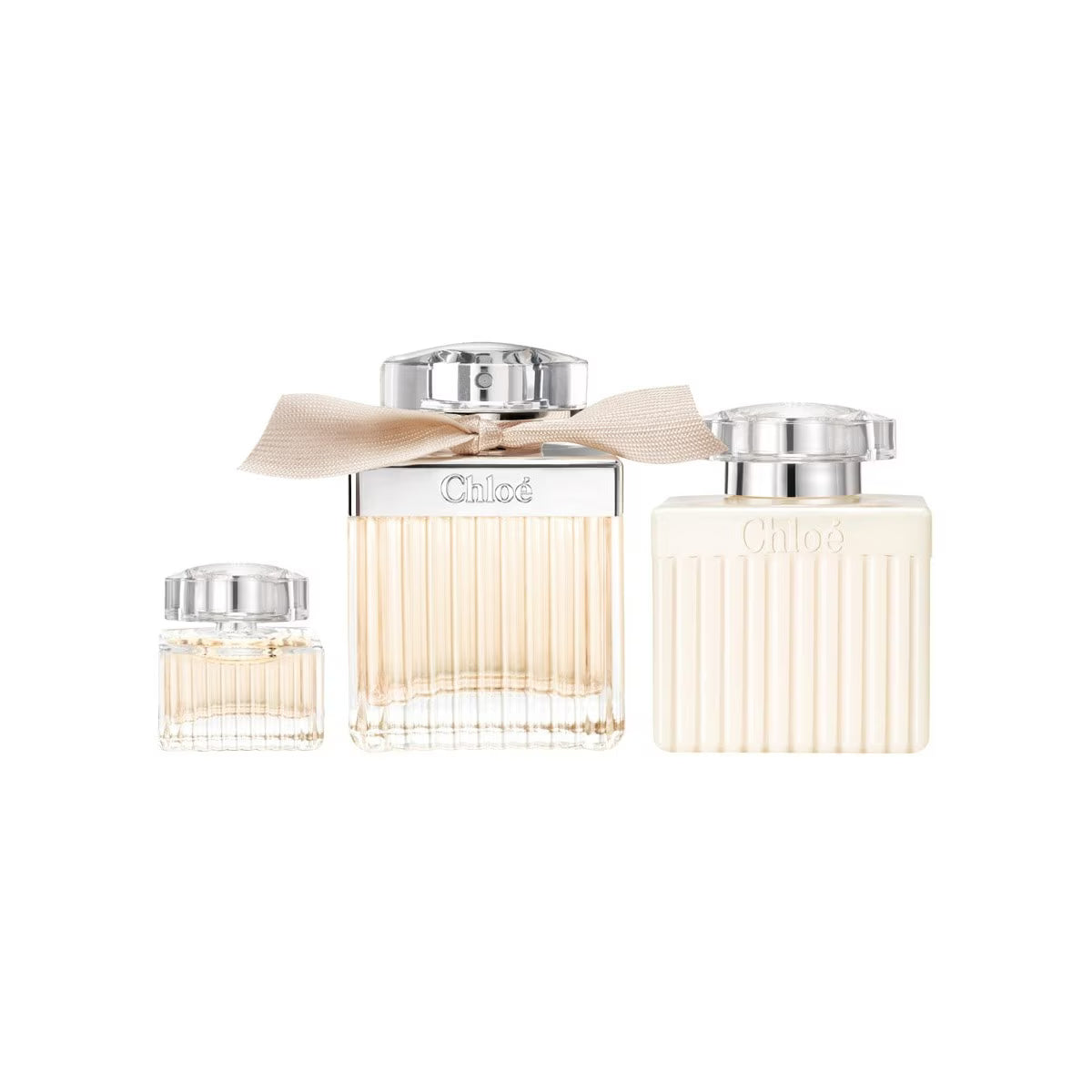 Chloé Eau De Parfum Gift Set with 100ml bottle, 5ml miniature, and 100ml body lotion in signature beige packaging