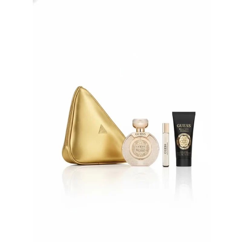 Guess perfume set with gold pouch, bottle, and tube on a white background