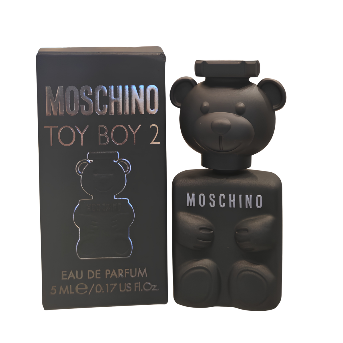 Moschino Toy Boy 2 Eau de Parfum 5ml dab-on in the iconic matte anthracite grey teddy bear bottle with soft-touch finish and its black packaging box, featuring a bear-shaped bottle and box on a white background.