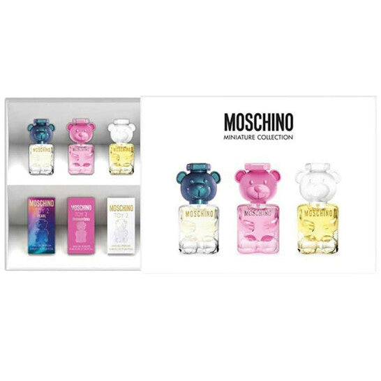 Moschino miniature perfume collection with colorful bottles on a white background