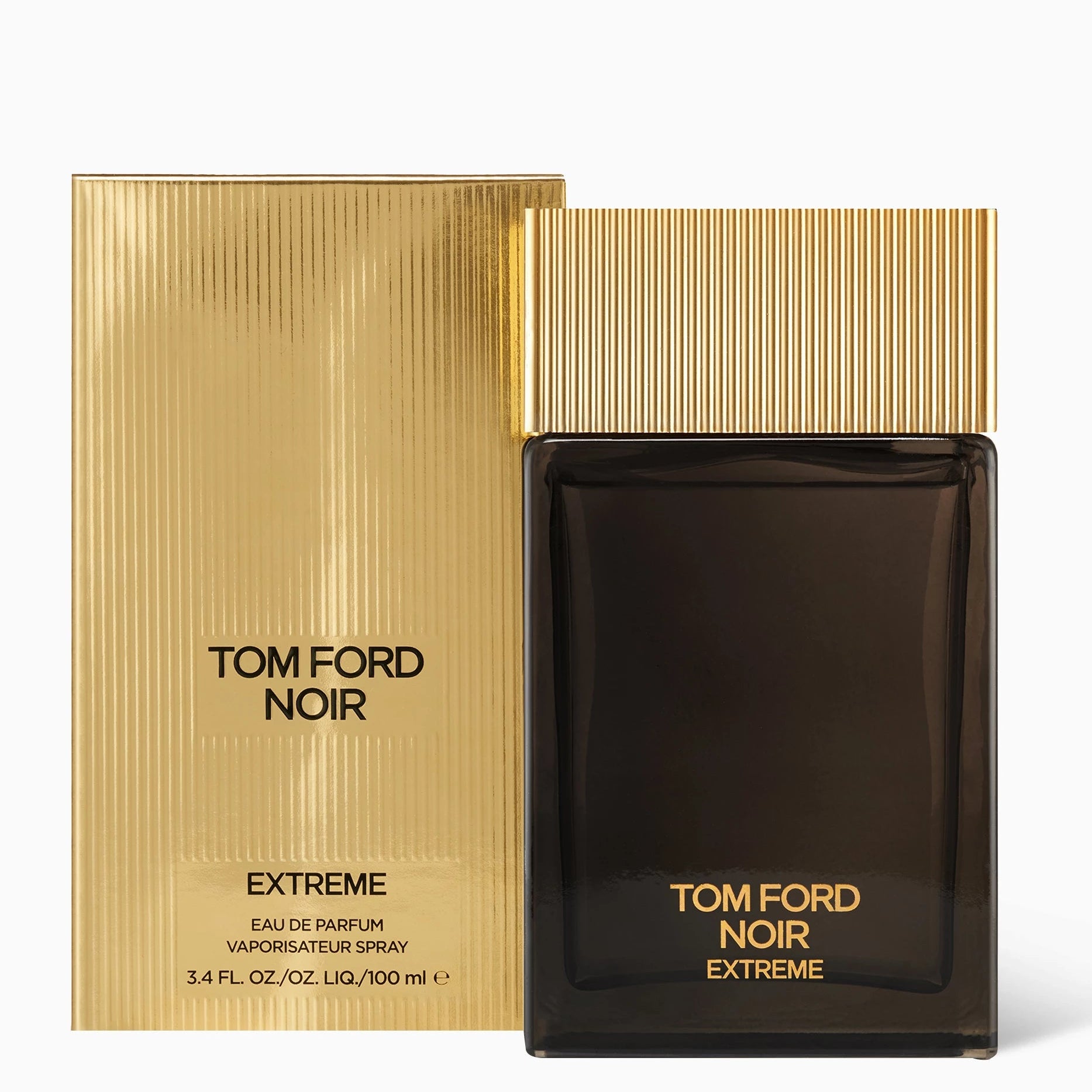Tom Ford Noir Extreme Eau de Parfum bottle in a dark amber glass with a ribbed gold cap, shown next to its gold textured packaging box on a white background.