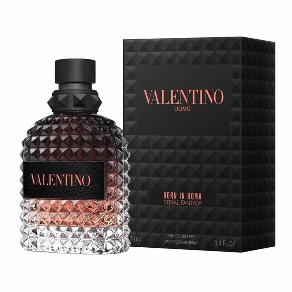 Valentino Uomo Corail Fantasy eau de toilette spray bottle next to its black textured packaging box, on a white background.